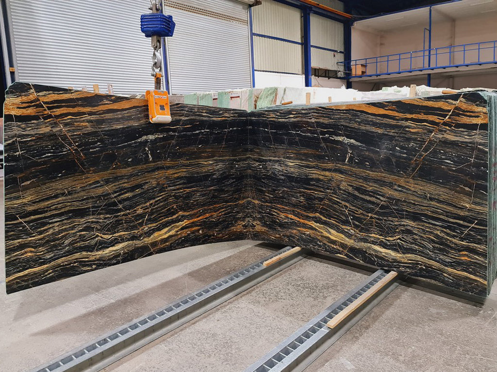 Black Marble with gold veining slabs book matched